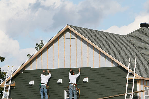 Professional Siding Installation technician working in Fort Hill, PA